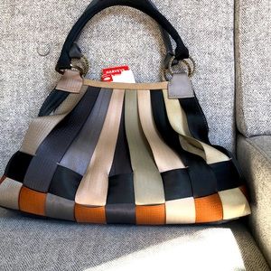 Harveys hobo, shoulder strap. Neutral, pop of color. Very fun to wear! Durable